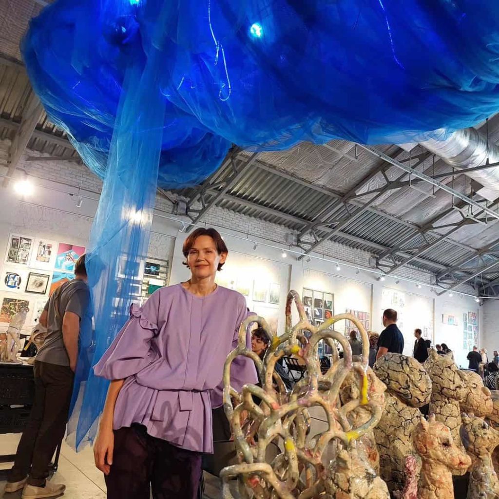 Ceramic artist Violetta Bora at her exhibition