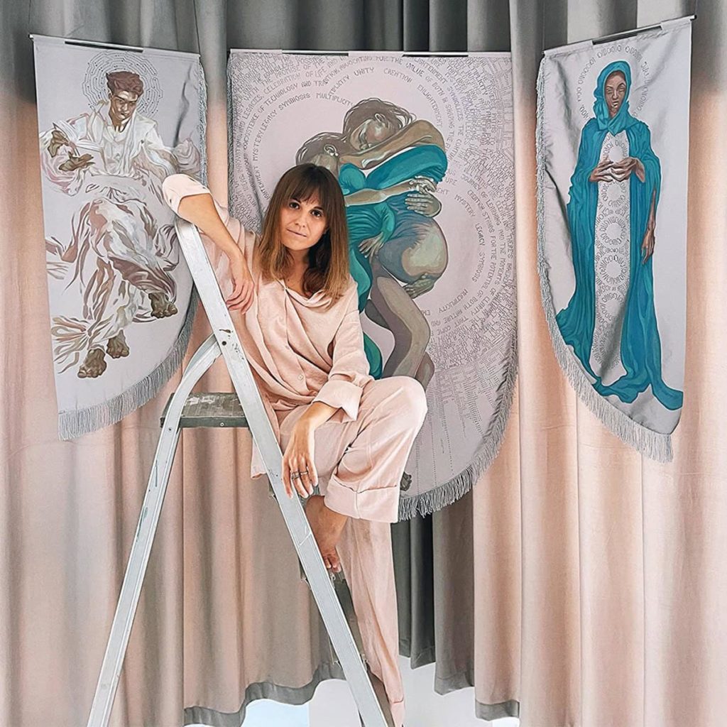 Artist Xenia RAW with her textile panels