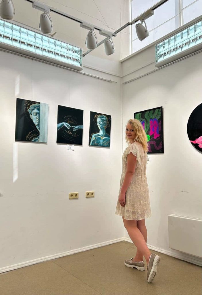 Artist Natali Nishchuk at her exhibition